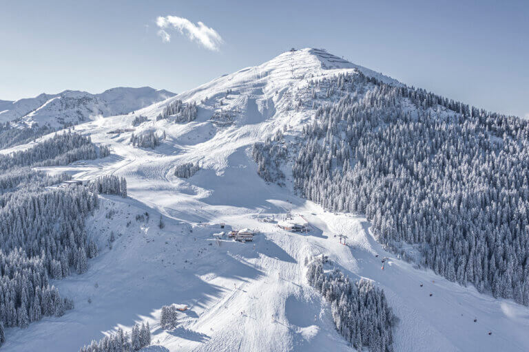 Aerial view of the Skicircus Saalbach Hinterglemm ski area in winter, Austria