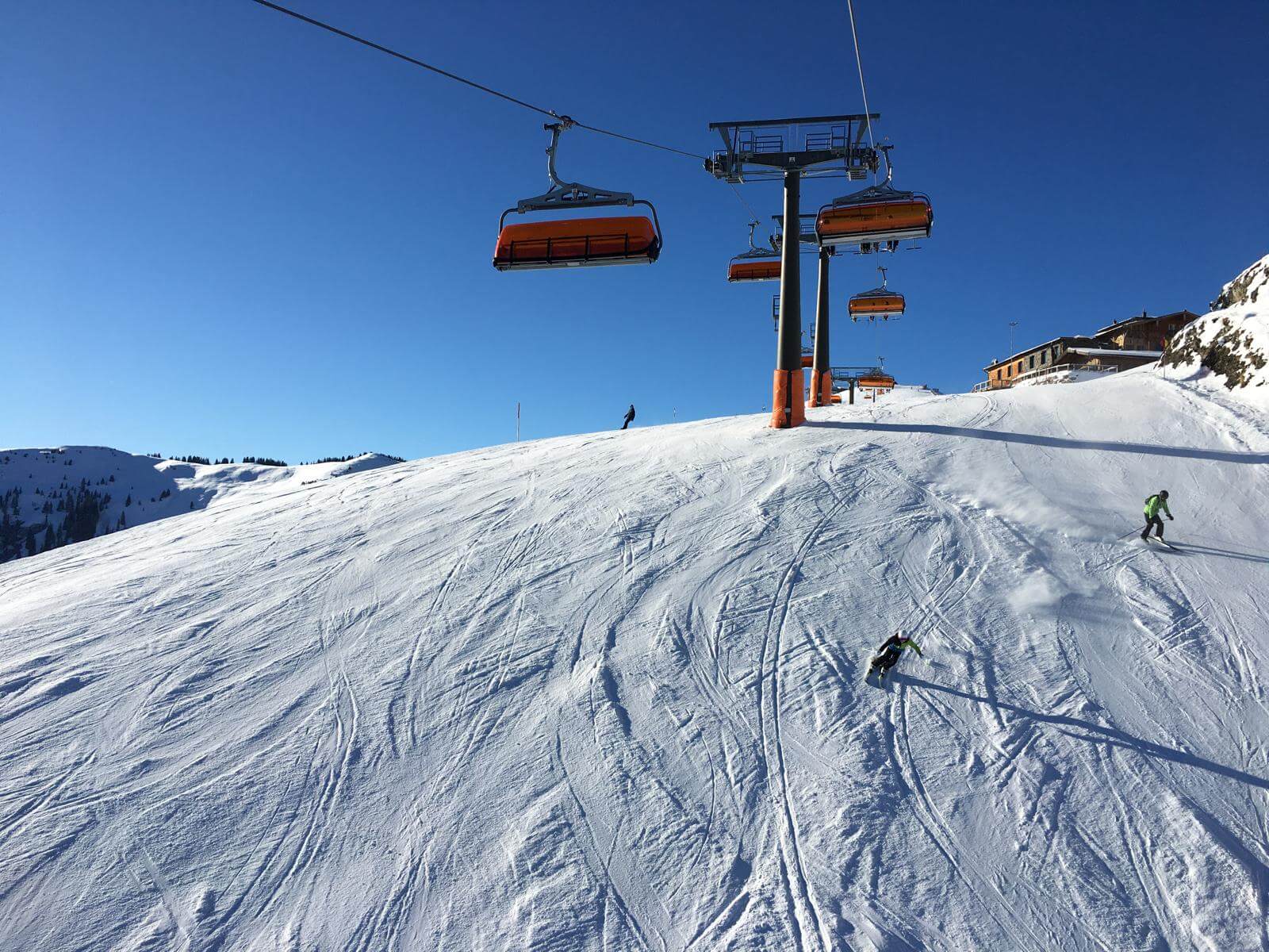 Chairlift under a blue sky in Saalbach Hinterglemm Leogang at Easter